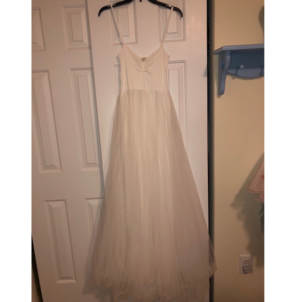 off white floor length gown with tulle skirt